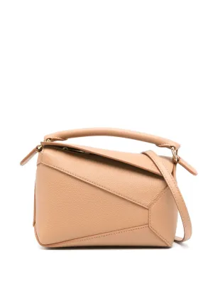 Puzzle edge mini leather handbag