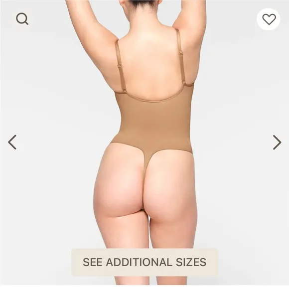 SKIMS Seamless Thong Sculpt Bodysuit in a light TAN color Sz L/XL