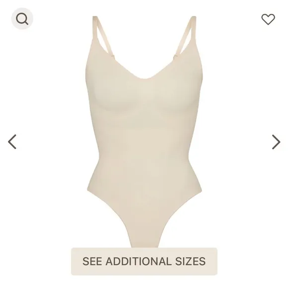 SKIMS Seamless Thong Sculpt Bodysuit in a light TAN color Sz L/XL