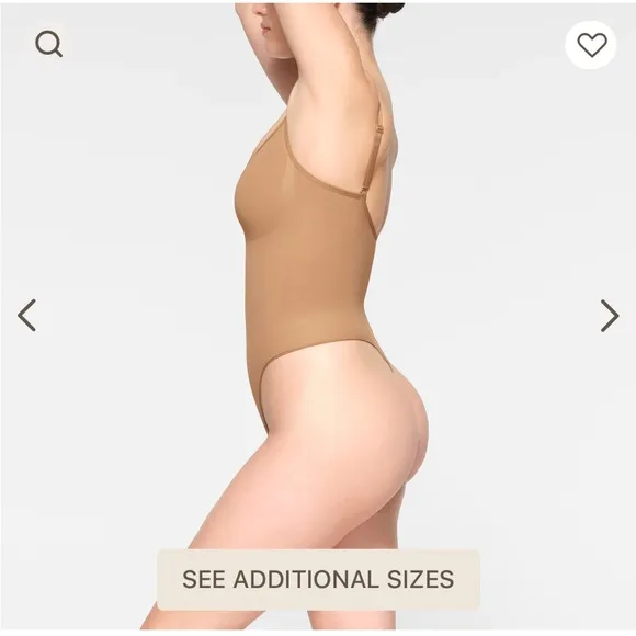SKIMS Seamless Thong Sculpt Bodysuit in a light TAN color Sz L/XL